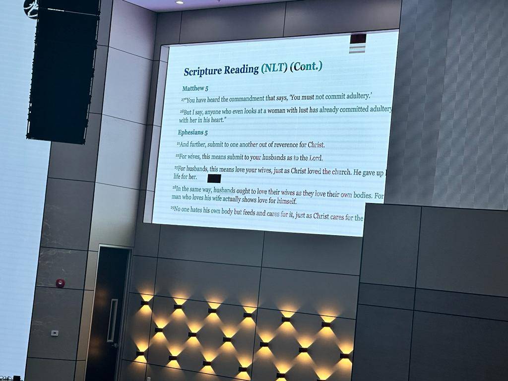 LED wall displaying scripture text clearly during a church service