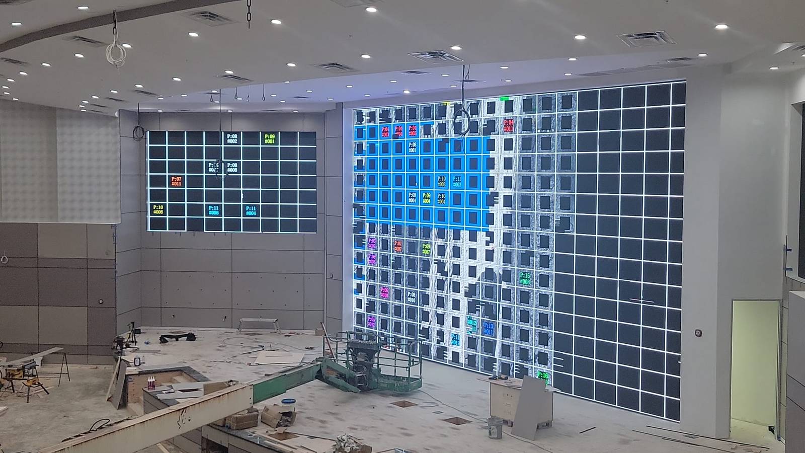 LED walls displaying panel mapping numbers during system configuration