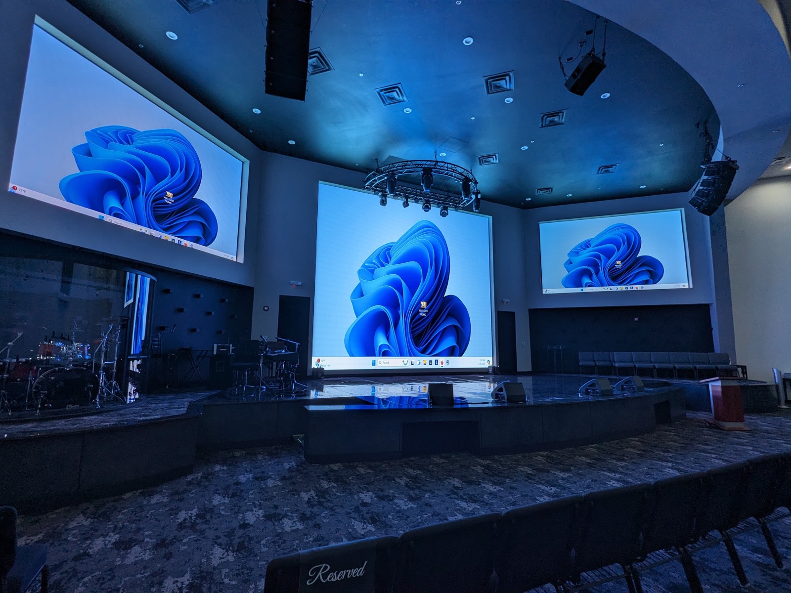 Finished worship auditorium with three LED video walls